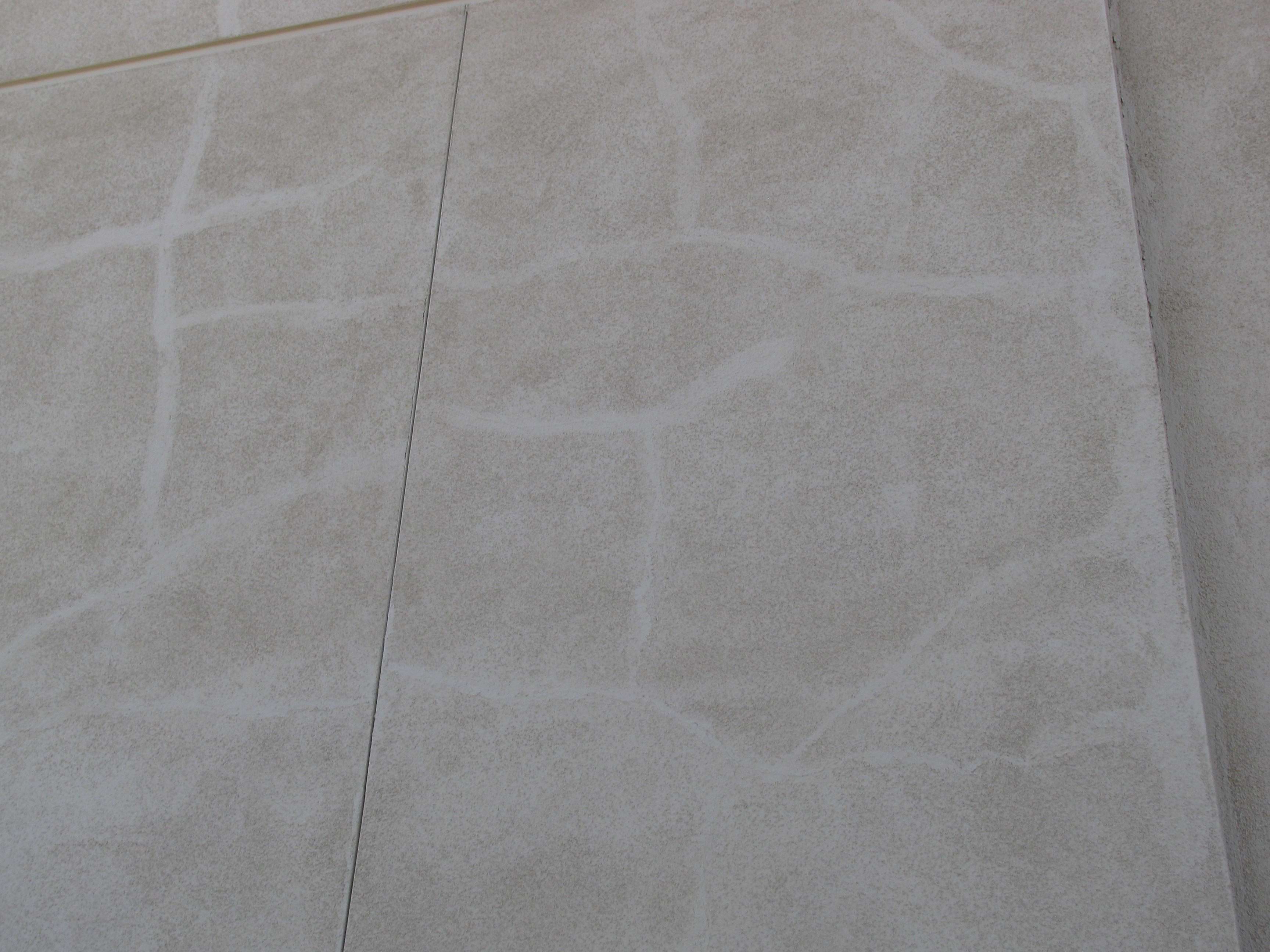 Patched Stucco Cracks Showing